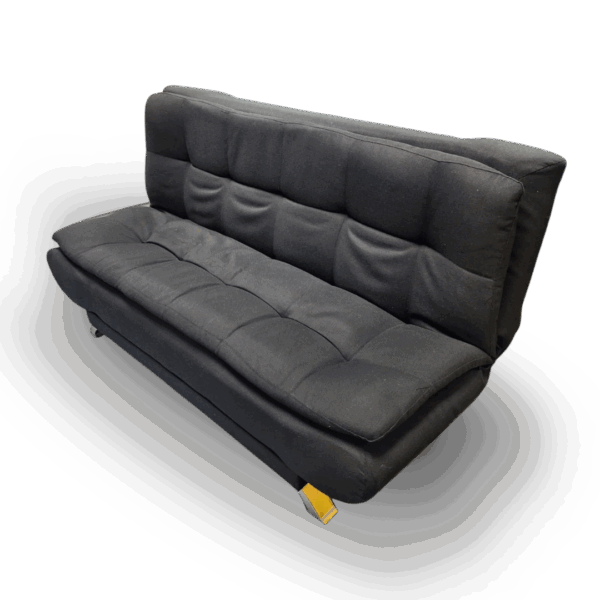 Charcoal-grey Everest Urban Luxe Sleeper Couch with tufted backrest and smooth cushions, displayed in a showroom among other modern sofas.