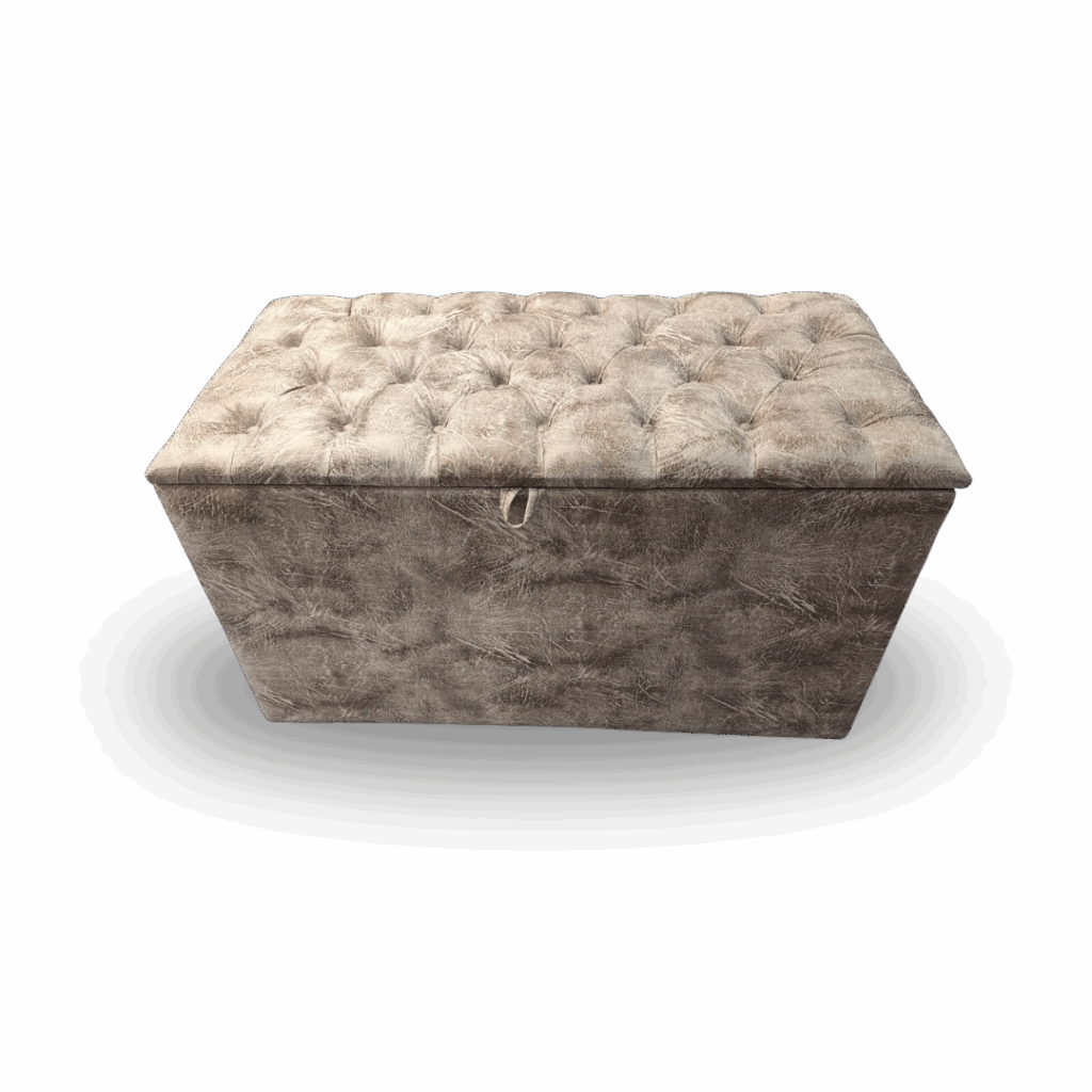 Plush taupe-grey tufted storage ottoman with soft velvet texture and lift-top lid.